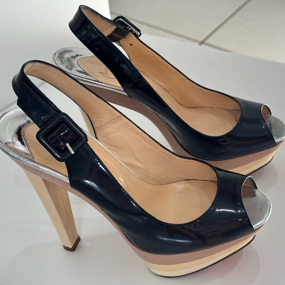 Christian Louboutin
Patent Leather Slingback Sandals
Women's Size: 6 | IT 36